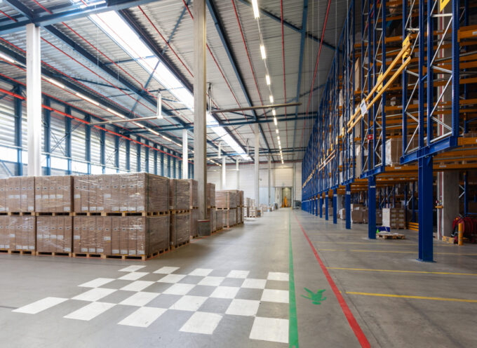 A view of full warehouse with forklift